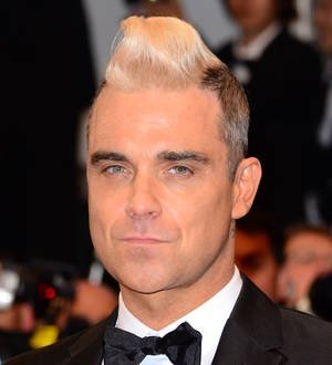 Robbie Williams denies X Factor judge rumors