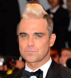 Robbie Williams denies X Factor judge rumors