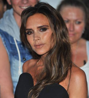 Victoria Beckham takes part in school race