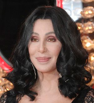 Cher Hands Unwanted Clothes to Charity Shops