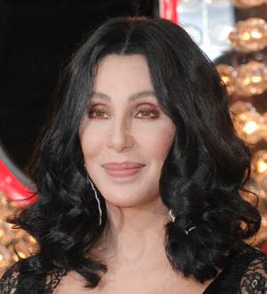 Cher Hands Unwanted Clothes to Charity Shops