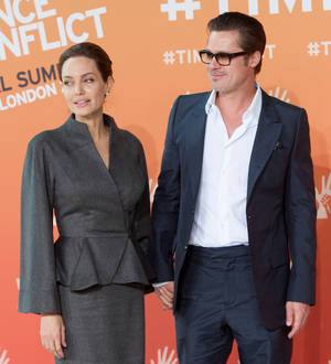 Firefighters attend Angelina Jolie and Brad Pitt's home
