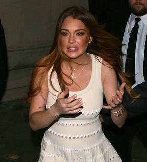 Lindsay Lohan reports for community service