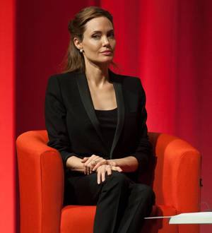 Angelina Jolie & Daniel Day-Lewis receive top honors from the Queen