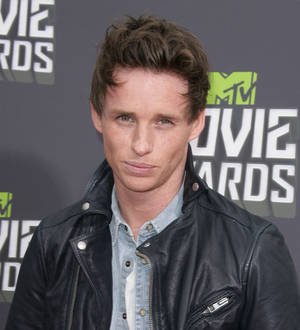 Eddie Redmayne shows off tennis skills at charity match