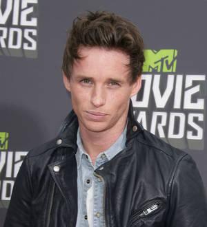 Eddie Redmayne shows off tennis skills at charity match