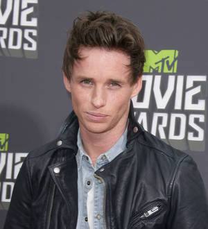 Eddie Redmayne shows off tennis skills at charity match