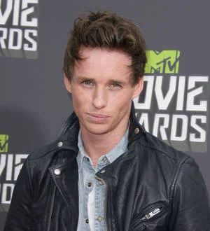 Eddie Redmayne shows off tennis skills at charity match