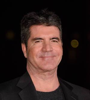 Simon Cowell to pen tell-all book