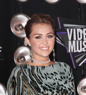 Miley Cyrus blasts 'rude' critics for targeting Kelly Osbourne