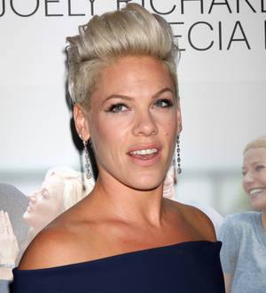 Pink postpones three more shows