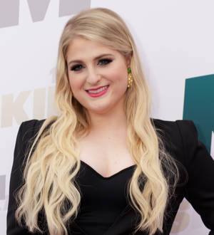 Fashion designer denies editing Meghan Trainor photos