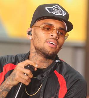Chris Brown carried from nightclub after BET Awards