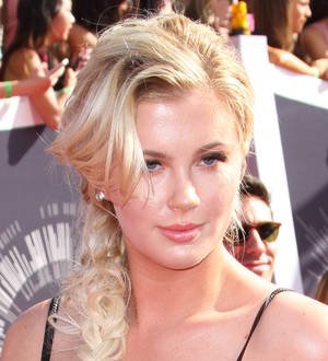 Alec Baldwin's teenage daughter is all grown up in sexy lingerie photos