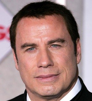 John Travolta calls for privacy law after topless royal shots