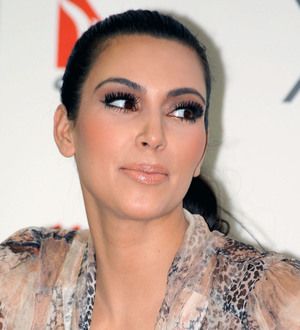 Kim Kardashian comes home after cutting Aussie trip short