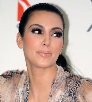 Kim Kardashian comes home after cutting Aussie trip short