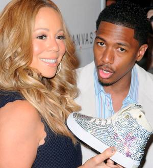 Mariah Carey and Nick Cannon bid big at charity auction