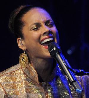 Alicia Keys leading charity concert for Harrison