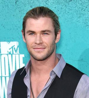 Chris Hemsworth lulls his daughter to sleep with tiny harmonica