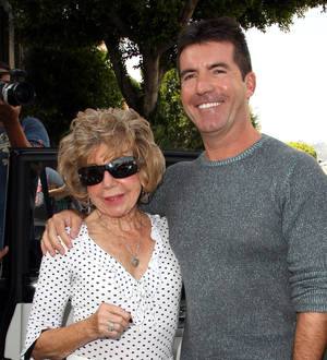 Simon Cowell scraps X Factor auditions after mother's death