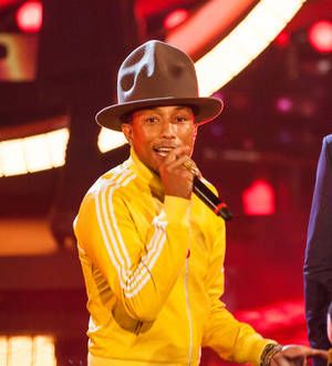 Fast food chain bosses win Pharrell Williams' hat at auction