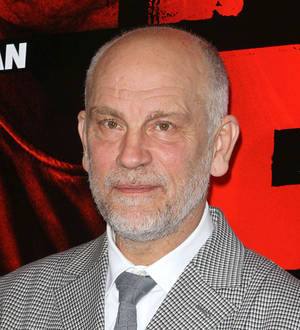 John Malkovich recruits Raul Julia's sons for fashion show
