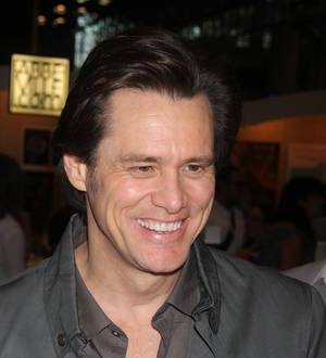 Jim Carrey amuses fans with Dumb & Dumber chipped tooth