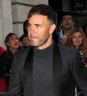 Take That regroup to switch on London's Christmas lights