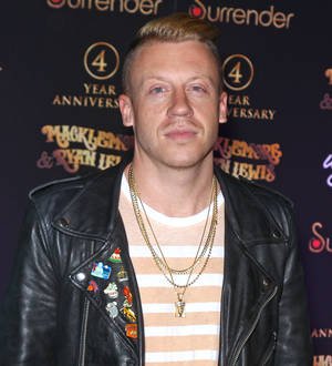 Macklemore and Q-Tip join protests over Michael Brown ruling