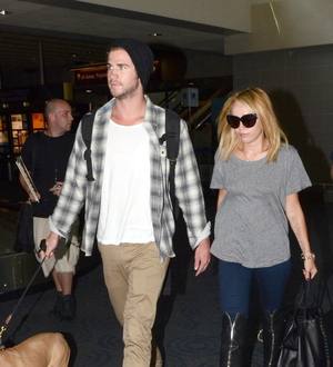 Miley Cyrus and Liam Hemsworth make home in her childhood house