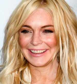 Lindsay Lohan forced to listen to the song she's suing Pitbull over at wedding