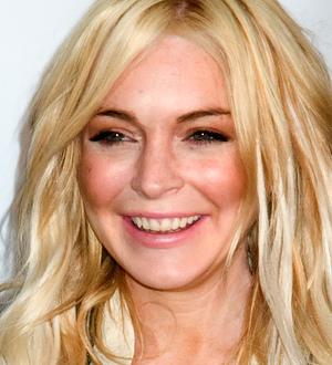 Lindsay Lohan forced to listen to the song she's suing Pitbull over at wedding