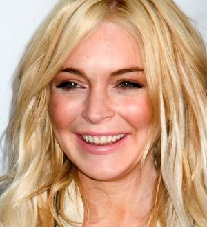 Lindsay Lohan forced to listen to the song she's suing Pitbull over at wedding