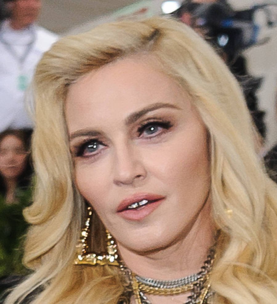 Madonna accepts damages over article published about twin girls