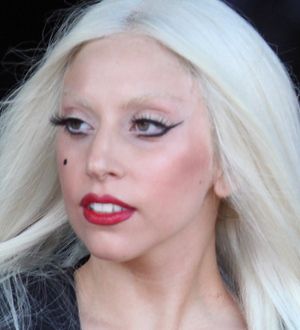 Lady Gaga poses in wedding gown