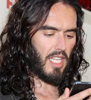 Russell Brand phones producer's dad during interview