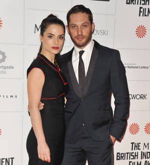 Tom Hardy calls fiancee 'my wife'
