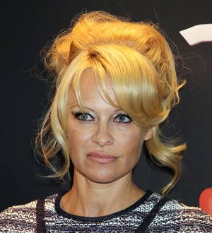 Pamela Anderson gets marathon prep from Ellen DeGeneres