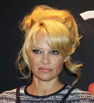 Pamela Anderson gets marathon prep from Ellen DeGeneres