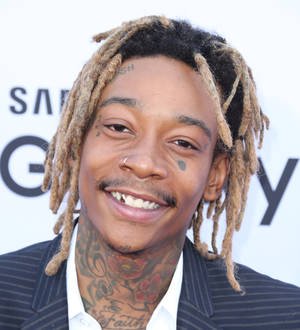 Wiz Khalifa holds onto number one for sixth week