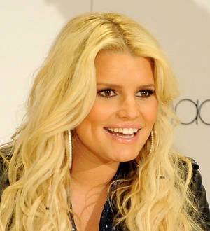 Jessica Simpson rules out more kids as she unveils baby Ace