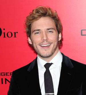 Sam Claflin's broken finger hasn't fully healed