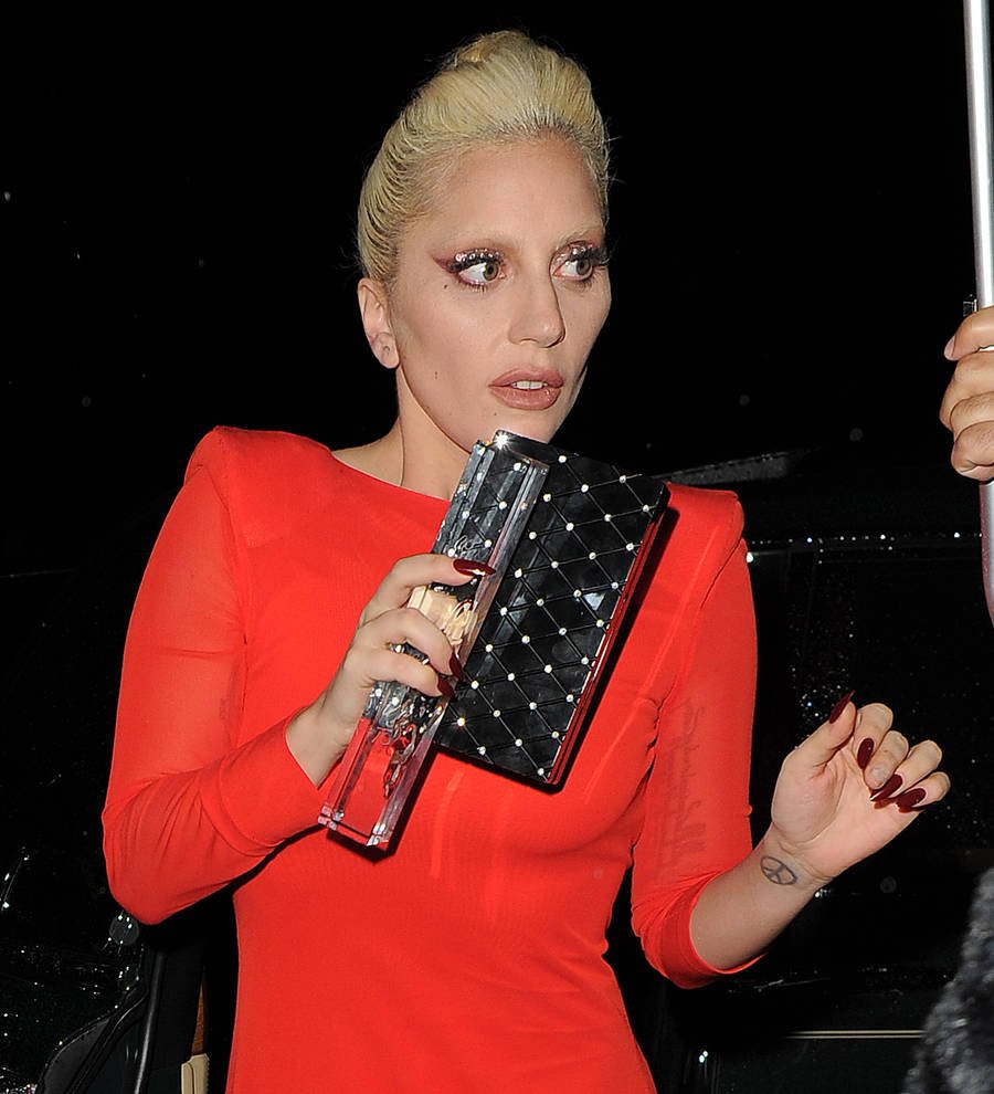 Lady Gaga dresses as Frank Sinatra for tribute show