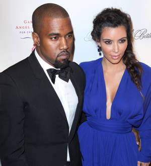 Kanye West defends relationship with Kim Kardashian