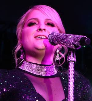 Meghan Trainor was inspired by romance heartbreak