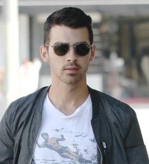 Joe Jonas celebrates birthday with Miley Cyrus impersonator