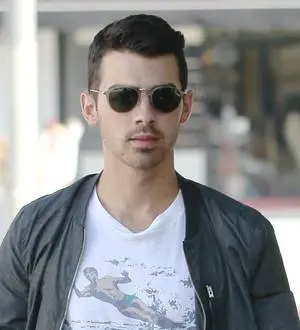 Joe Jonas celebrates birthday with Miley Cyrus impersonator