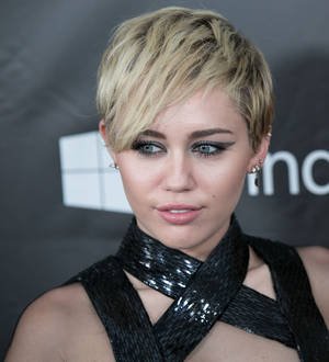 Miley Cyrus pictured smooching Patrick Schwarzenegger