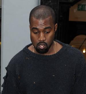 Kanye West gets emotional while paying tribute to fashion mentor